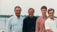 A still of Bernie Madoff along with his younger brother Peter Madoff and his two sons Mark and Andrew Madoff (Image Via GI/BM/Getty Images)